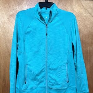 Women’s running jacket with thumb openings